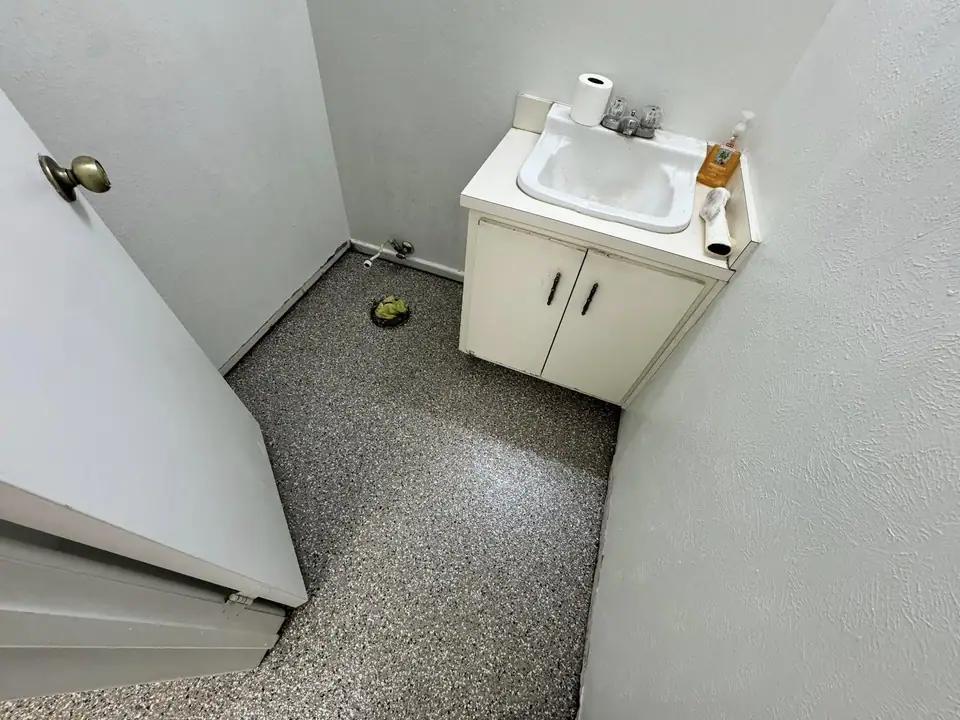 Bathroom floor coating project in Seminole, TX