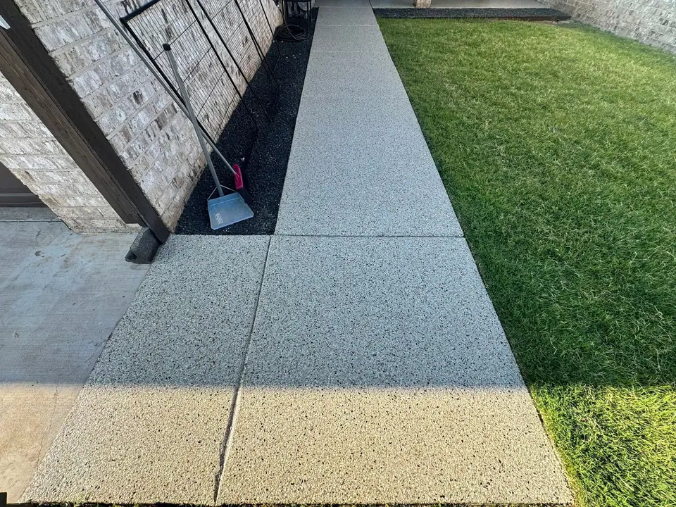 Side walkway concrete coating project in Andrews, TX